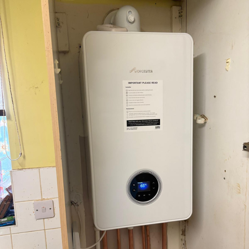 New boiler on finance installed in a kitchen cupboard by DS Plumbing and Heating
