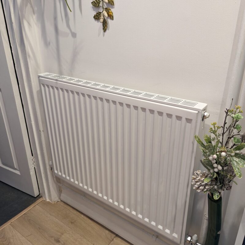A new medium sized radiator installed in Rebekah's property in Kettering